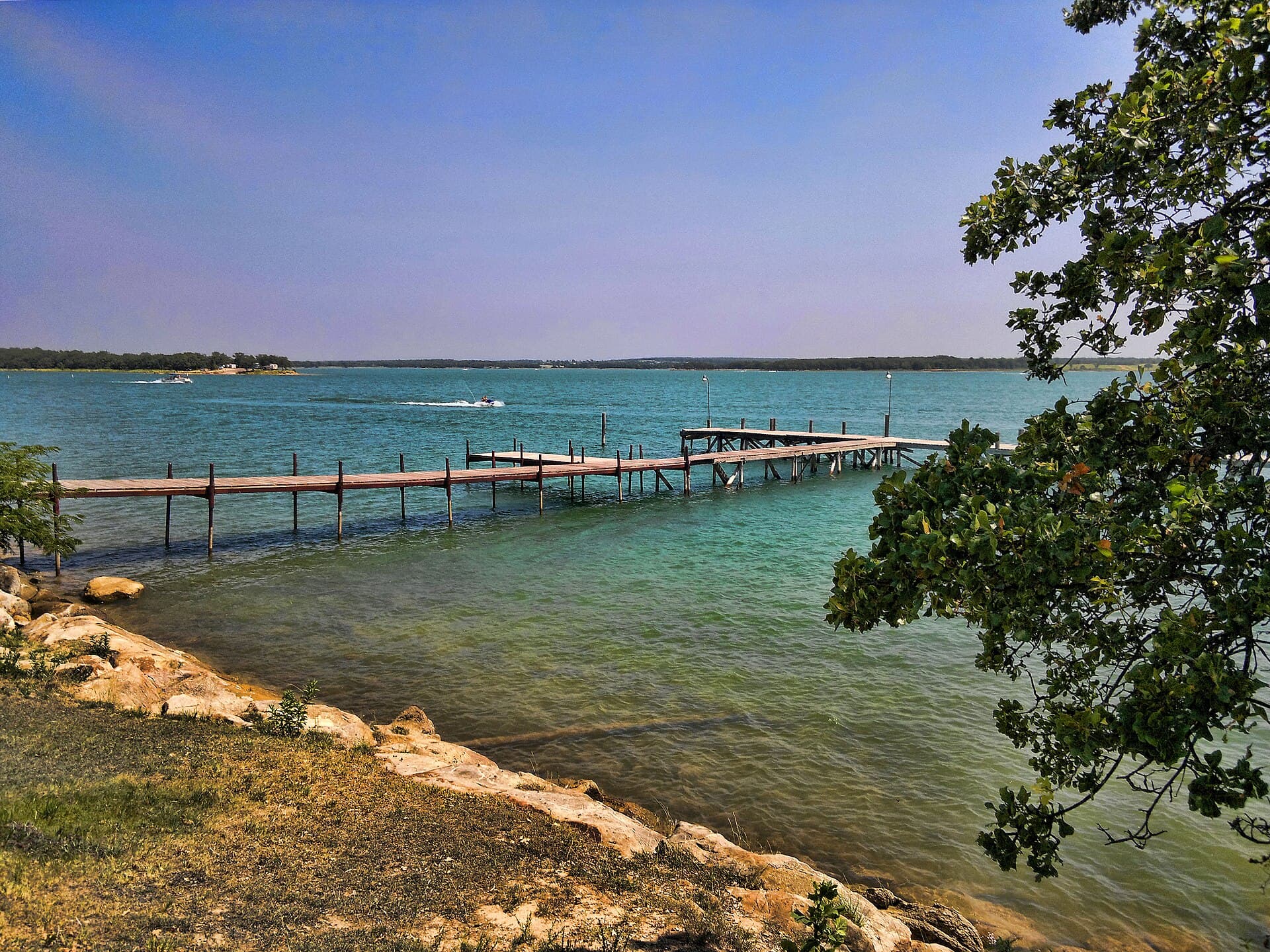 A dock extending into Lake Murray near the lodge